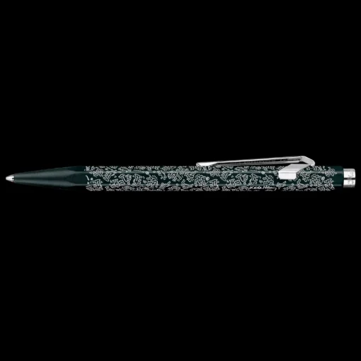 Estuche metálico con bolígrafo Negro Keith Haring Caran d'Ache