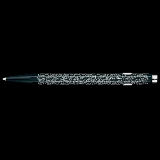 Estuche metálico con bolígrafo Negro Keith Haring Caran d'Ache