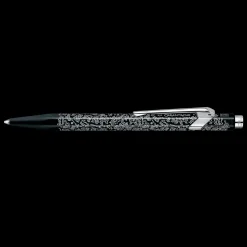 Estuche metálico con bolígrafo Negro Keith Haring Caran d'Ache