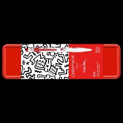 Estuche metálico con bolígrafo Blanco Keith Haring Caran d'Ache