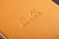 Libreta con puntos naranja A6 Rhodia